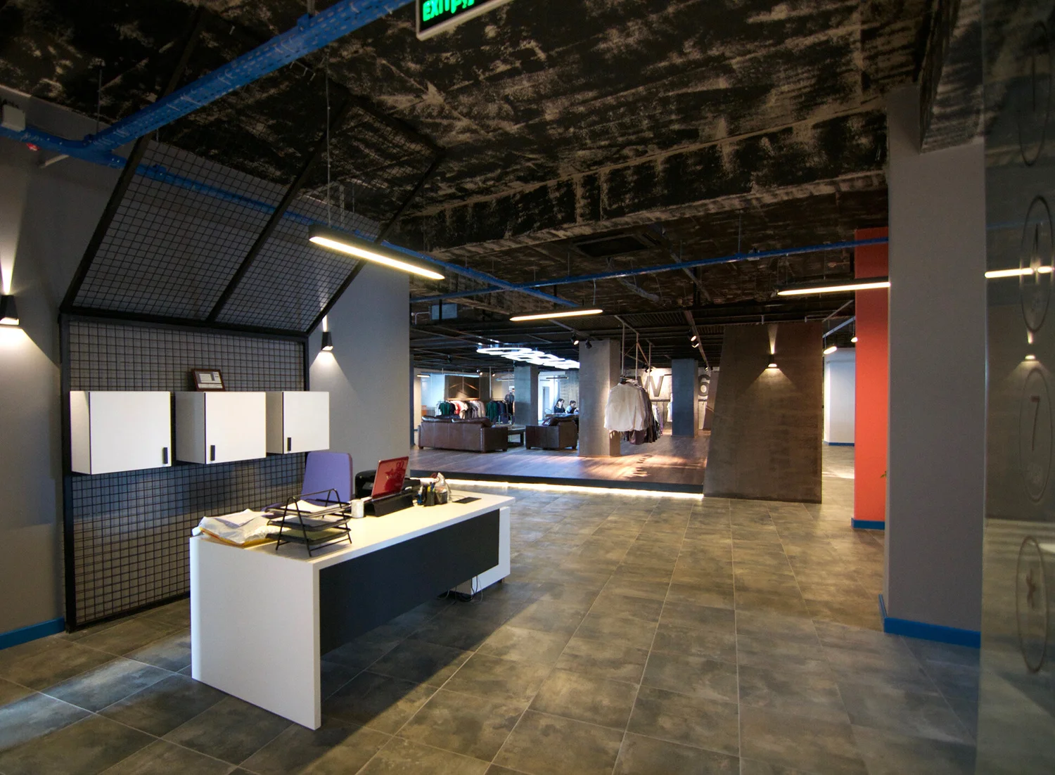 Creazone showroom with garment racks